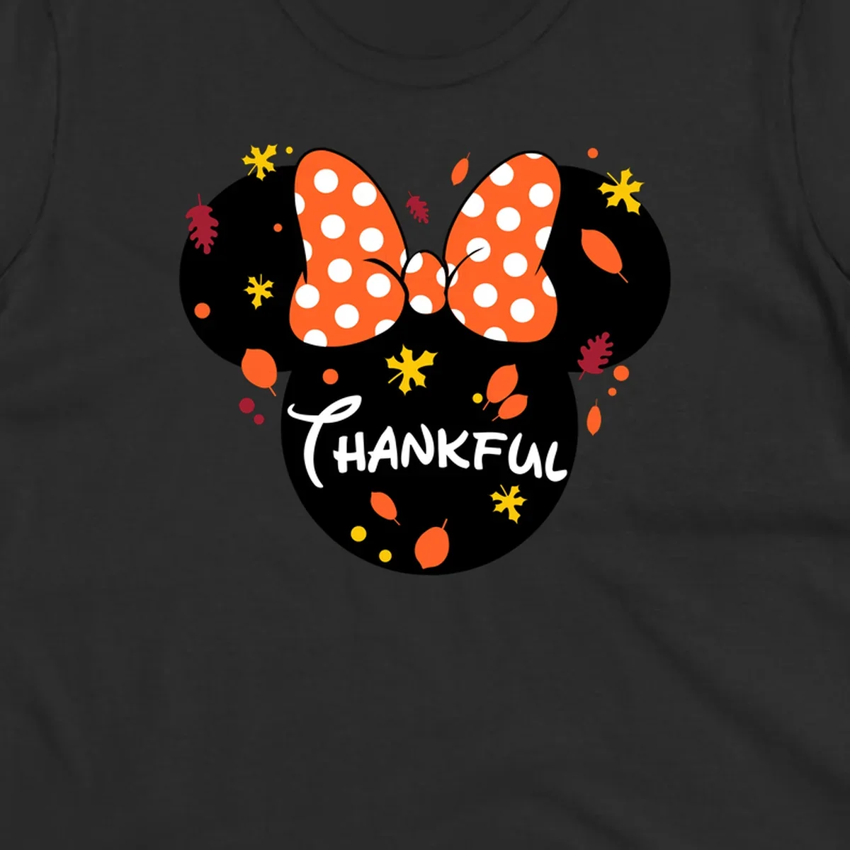 Minnie Mouse silhouette with polka dot bow and 'THANKFUL' text, surrounded by fall leaves.