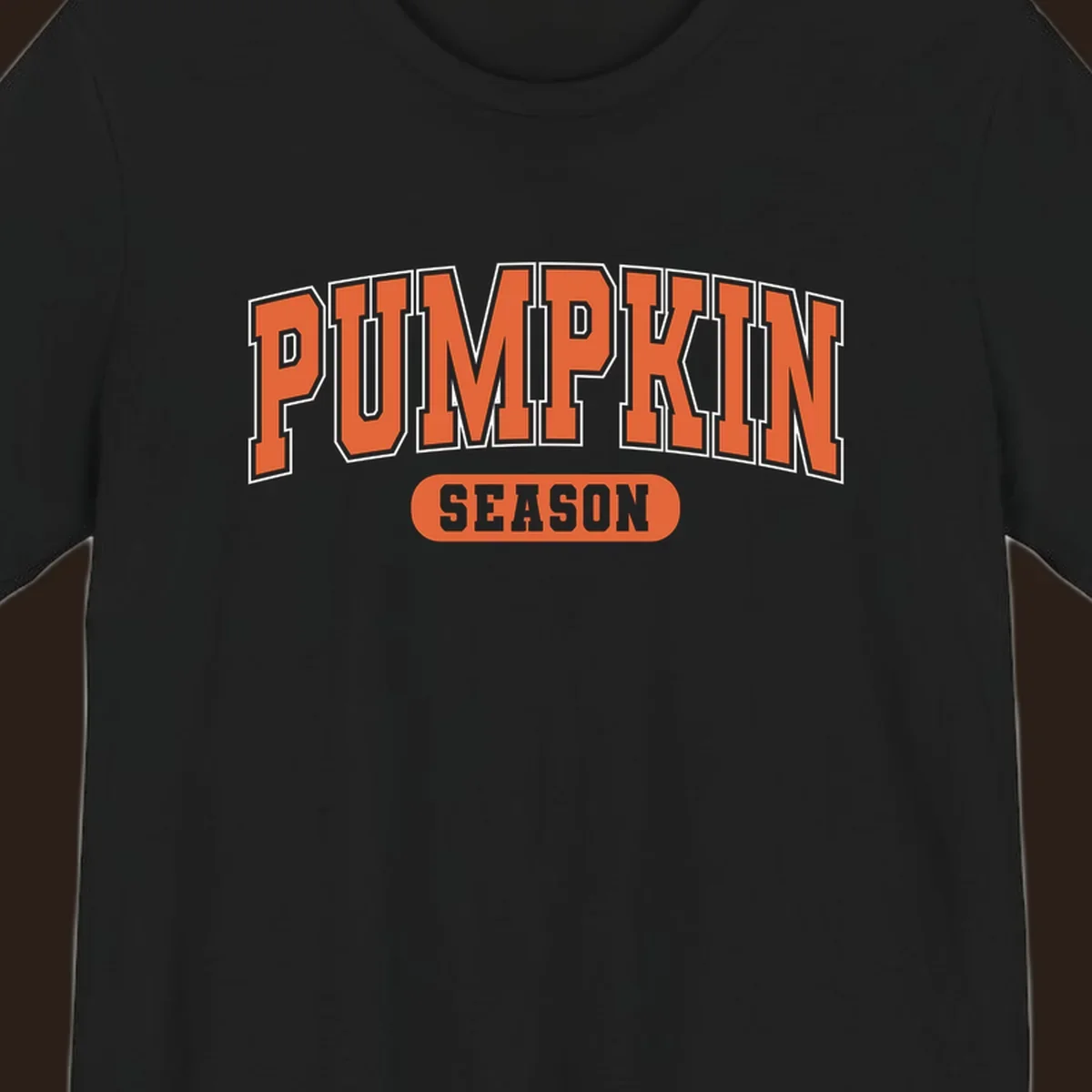 Pumpkin Season varsity text design in orange and white on black background.