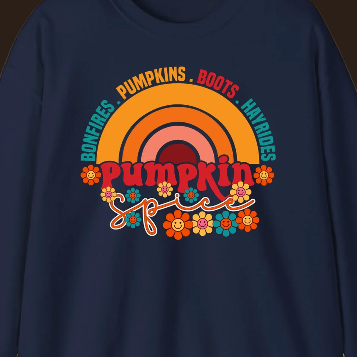 Retro pumpkin spice rainbow with flowers and fall text. pumpkin-spice-rainbow