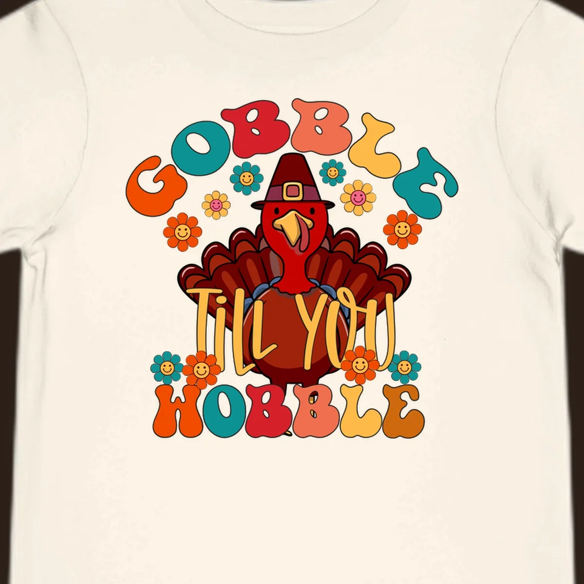 Gobble Till You Wobble turkey retro design with groovy flowers.