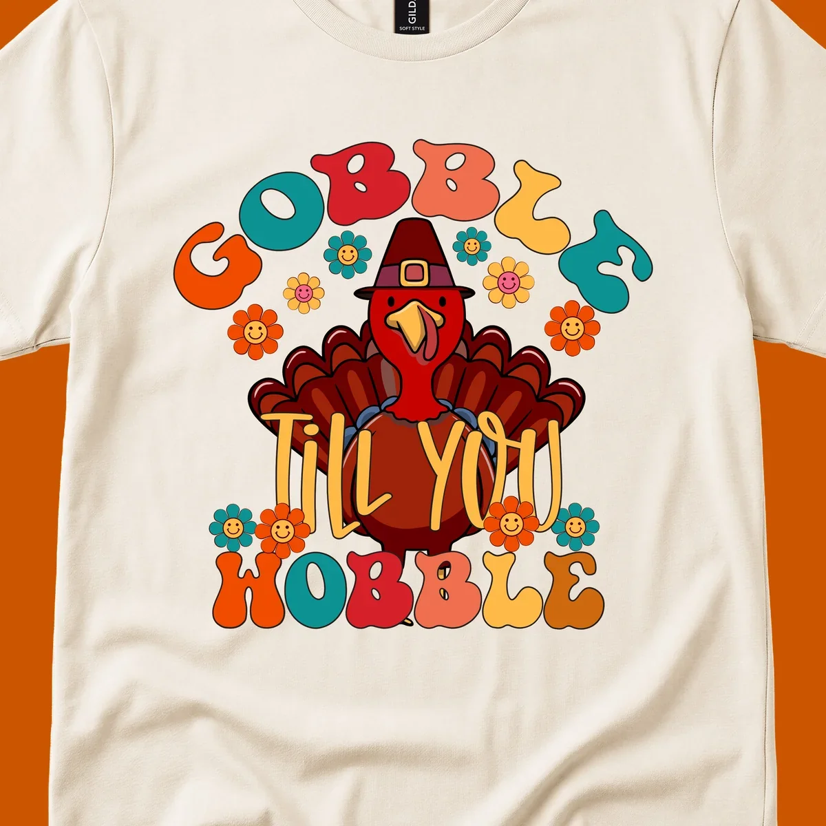 Gobble Till You Wobble turkey retro design with groovy flowers.