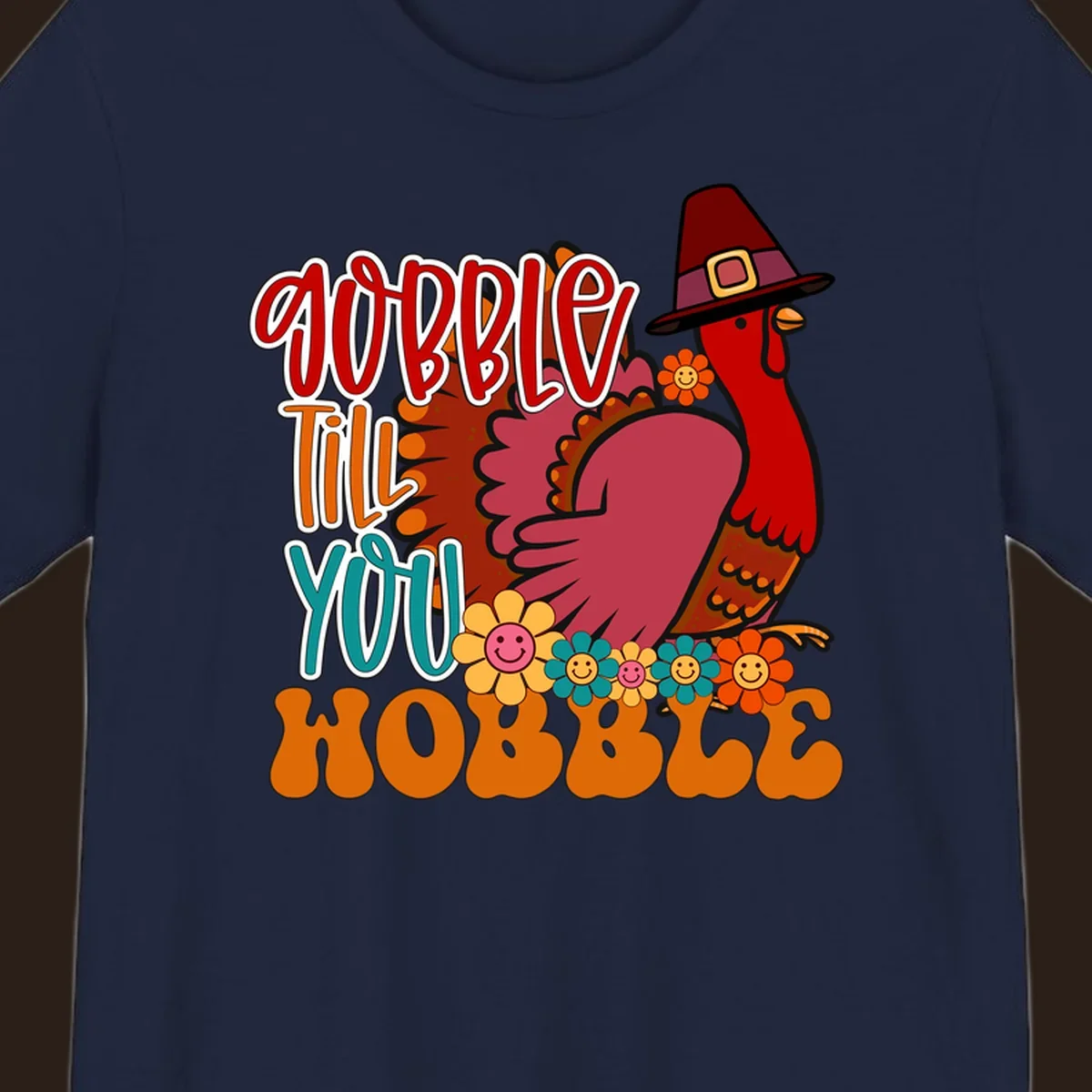 Gobble Till You Hobble Thanksgiving Turkey design with retro flowers and pilgrim hat.
