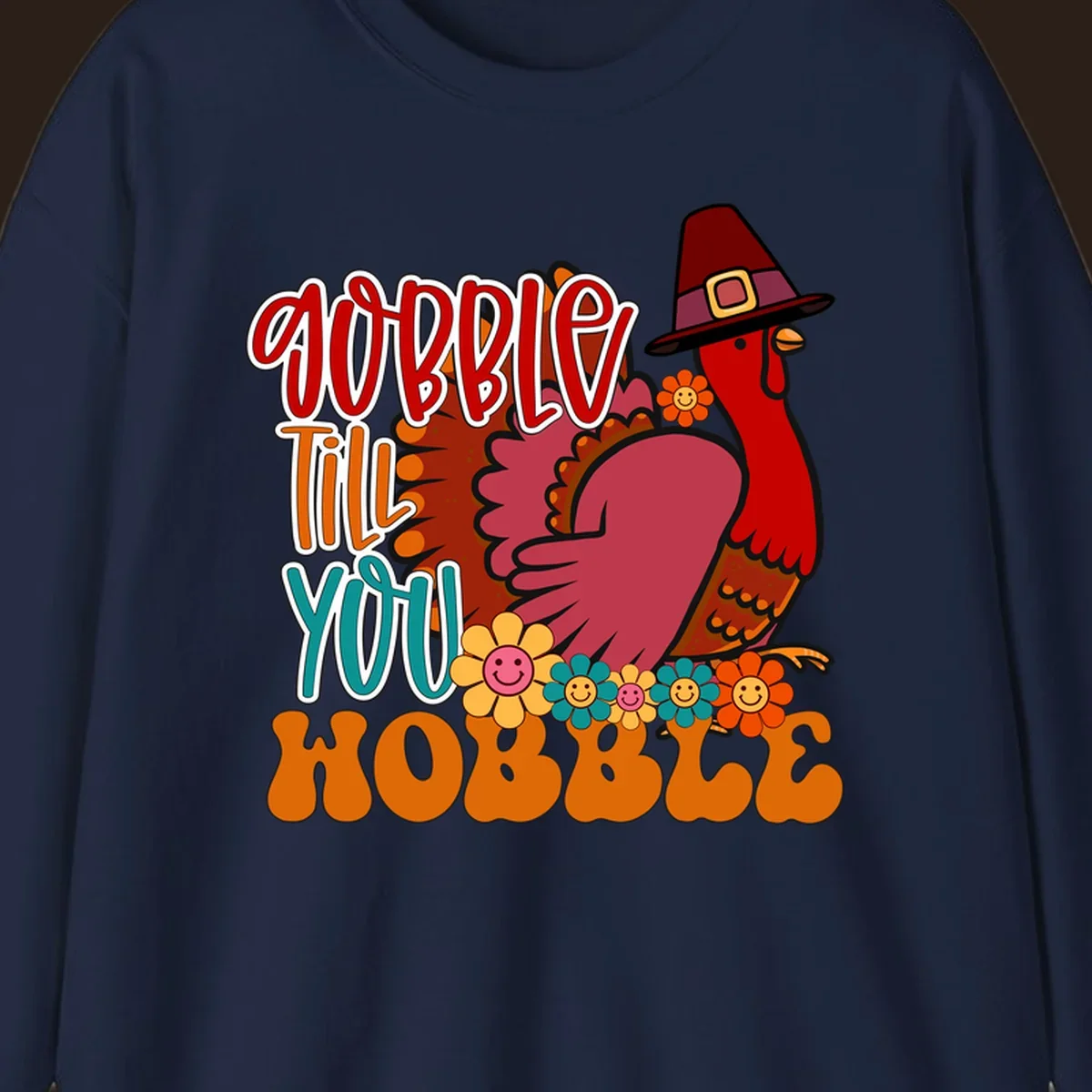 Gobble Till You Hobble Thanksgiving Turkey design with retro flowers and pilgrim hat.