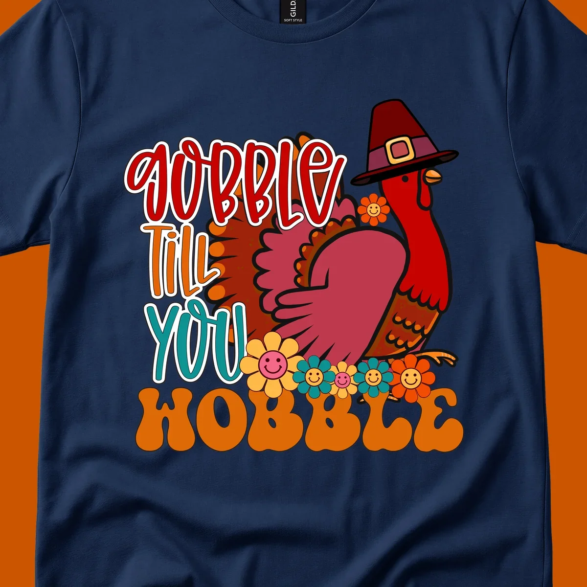 Gobble Till You Hobble Thanksgiving Turkey design with retro flowers and pilgrim hat.