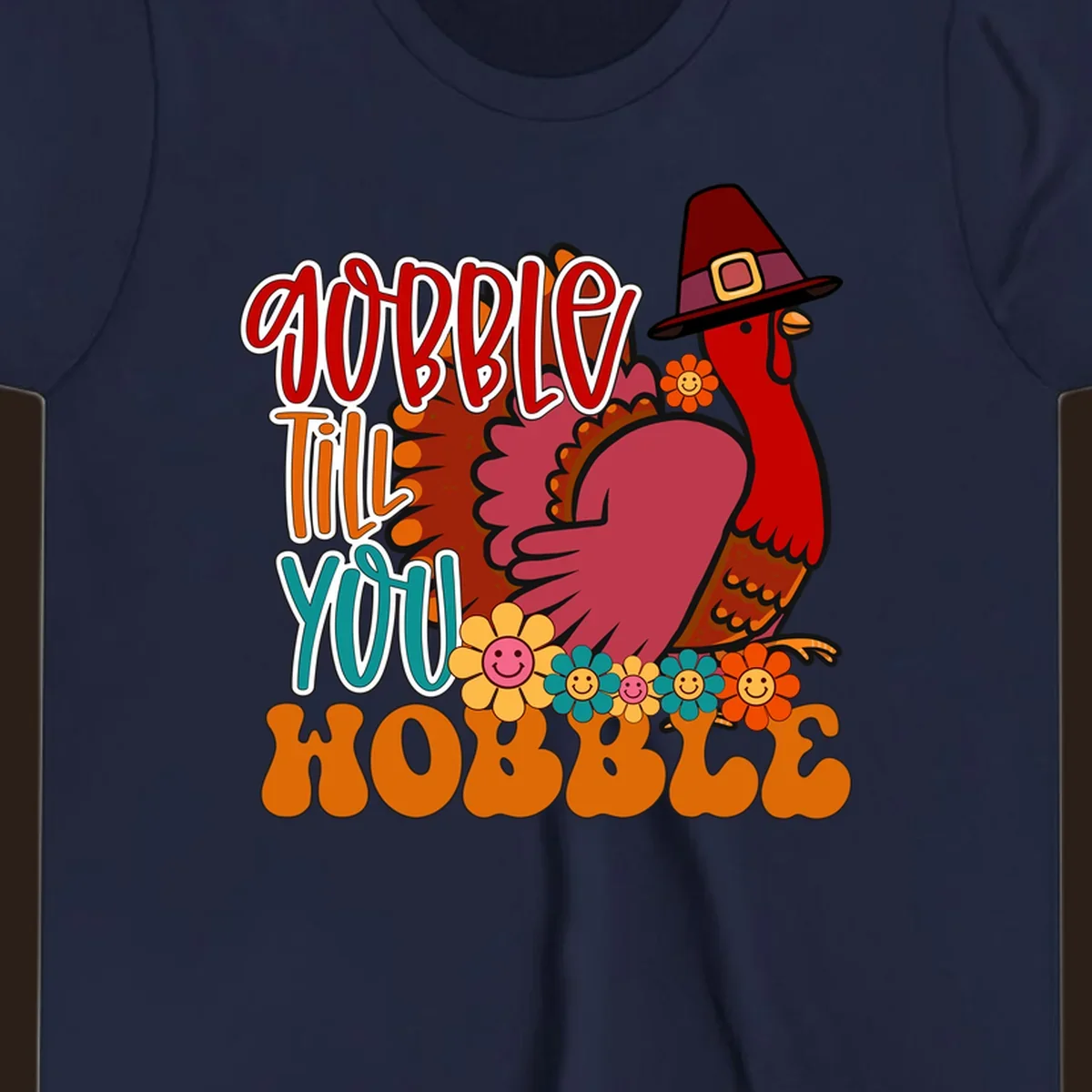 Gobble Till You Hobble Thanksgiving Turkey design with retro flowers and pilgrim hat.