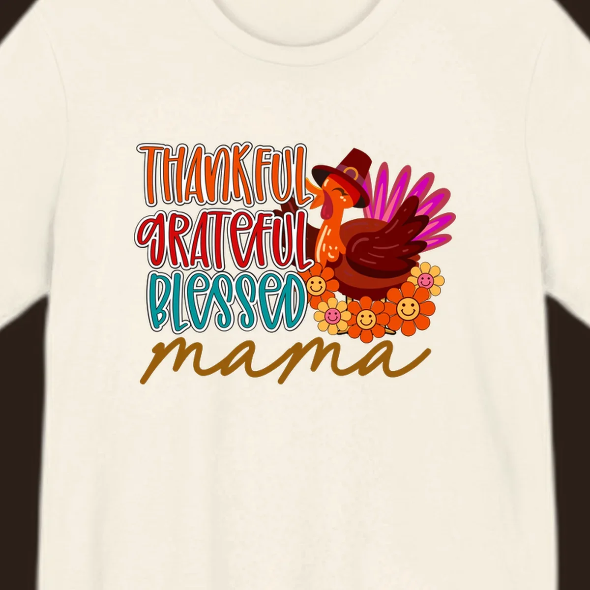 Thanksgiving mama turkey floral design with smiling flowers and colorful text.