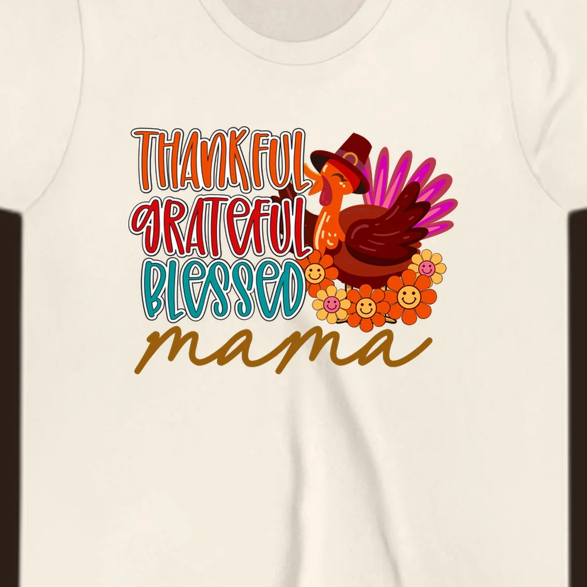 Thanksgiving mama turkey floral design with smiling flowers and colorful text.