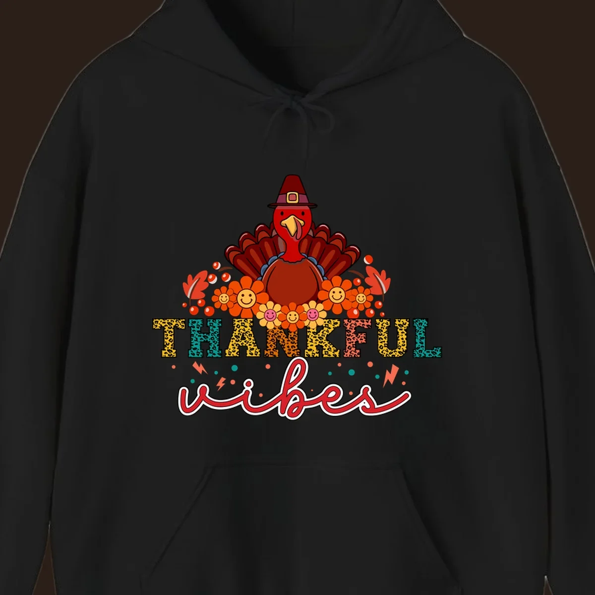 Retro Thanksgiving thankful vibes design with a turkey, flowers, and leopard print text.