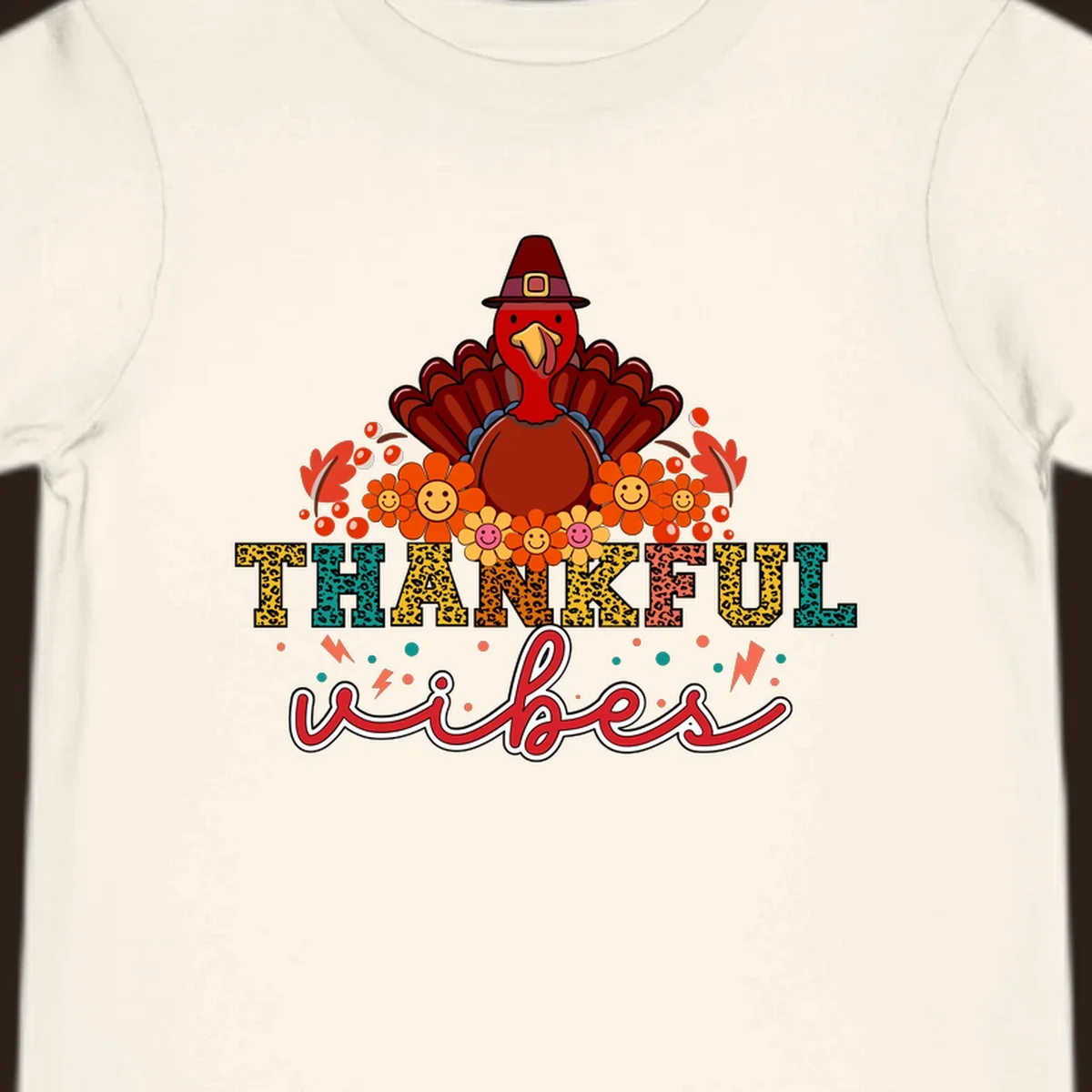 Retro Thanksgiving thankful vibes design with a turkey, flowers, and leopard print text.