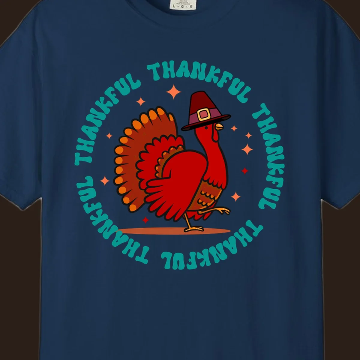 Thanksgiving turkey wearing a pilgrim hat with 'THANKFUL' text and starbursts.