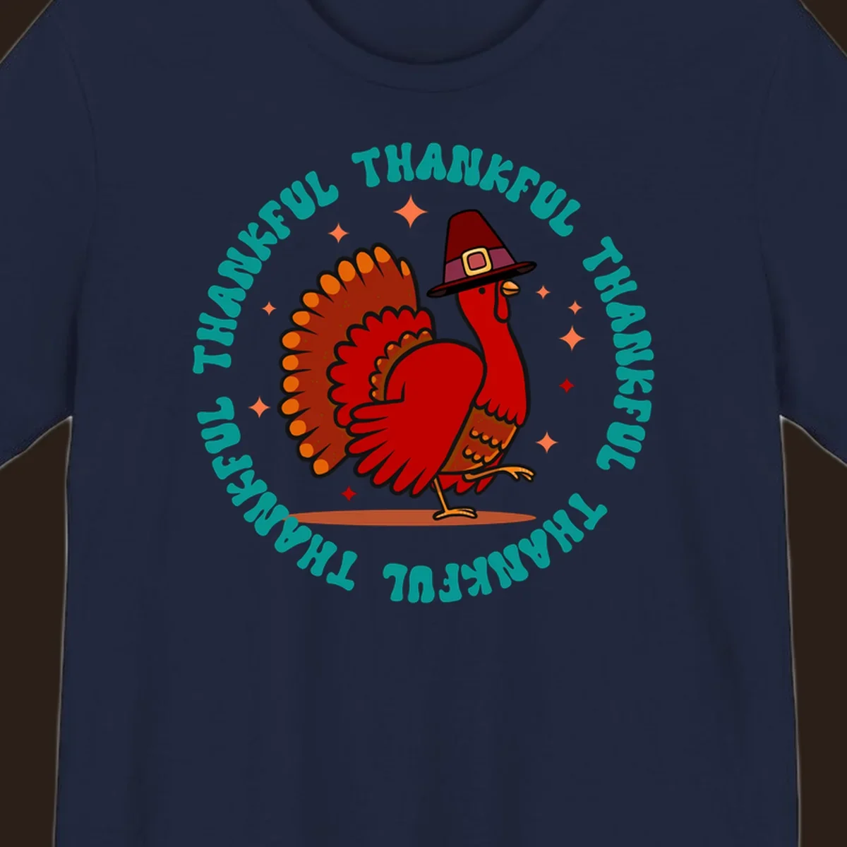 Thanksgiving turkey wearing a pilgrim hat with 'THANKFUL' text and starbursts.