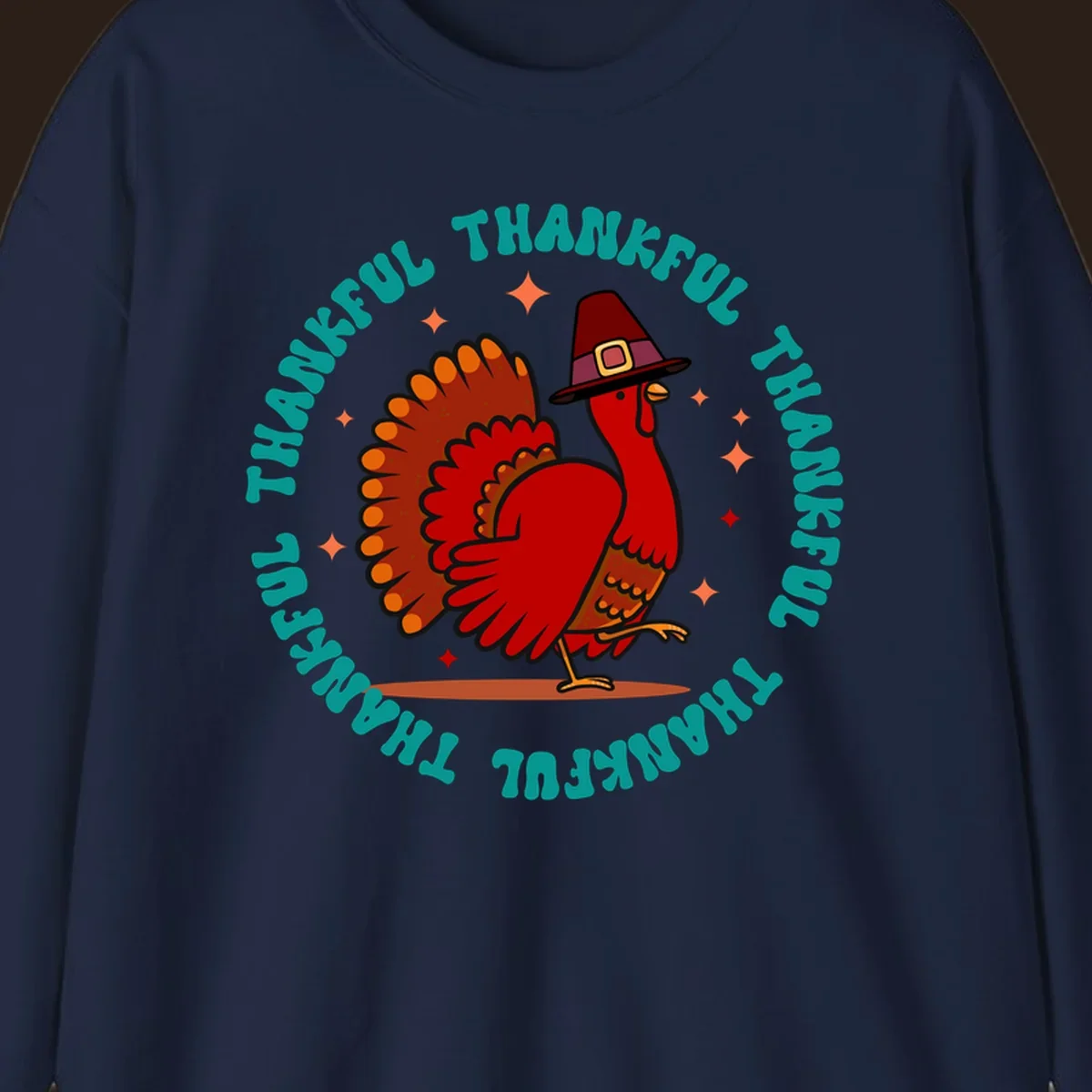 Thanksgiving turkey wearing a pilgrim hat with 'THANKFUL' text and starbursts.