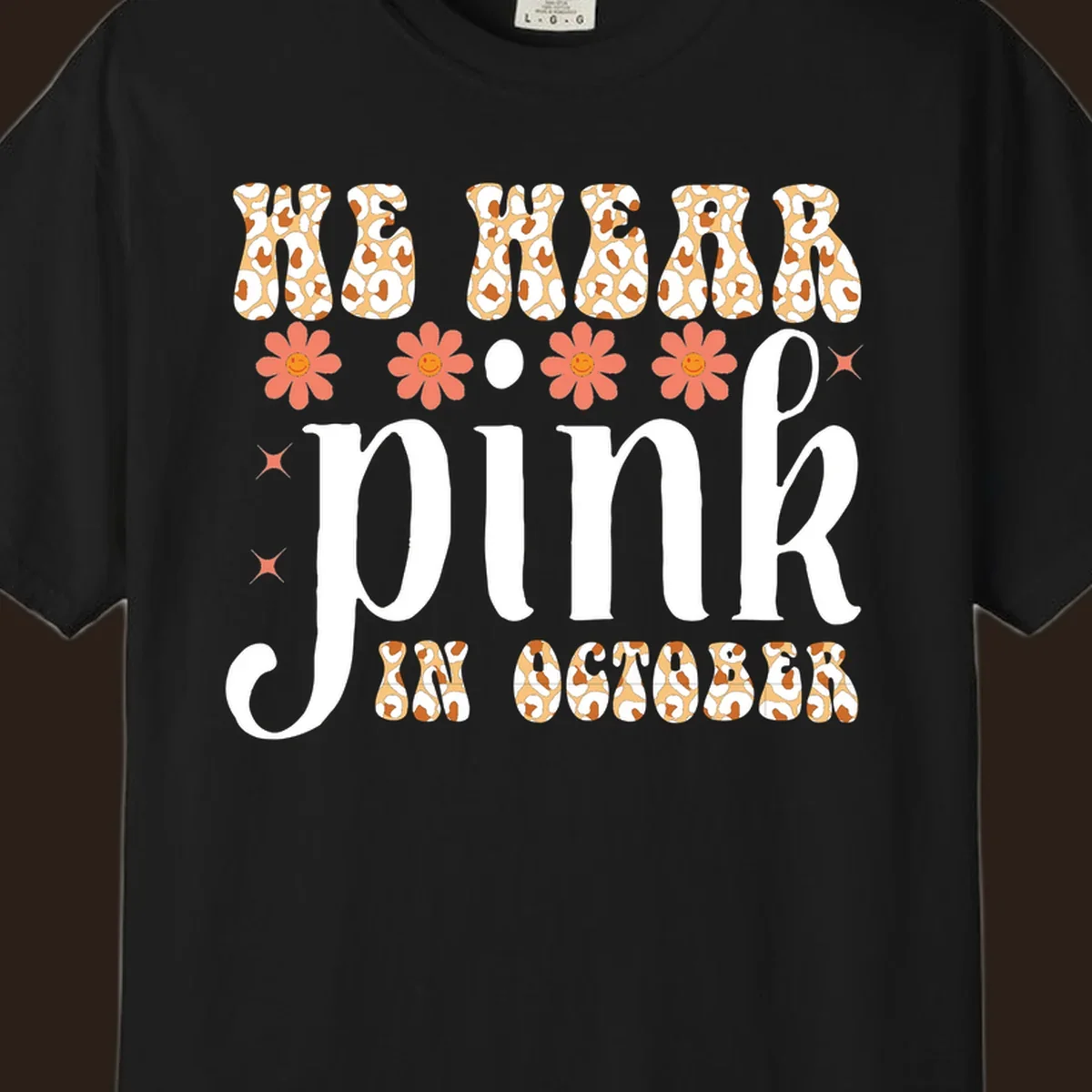 Retro "WE WEAR pink IN OCTOBER" design with leopard print and smiling flowers.