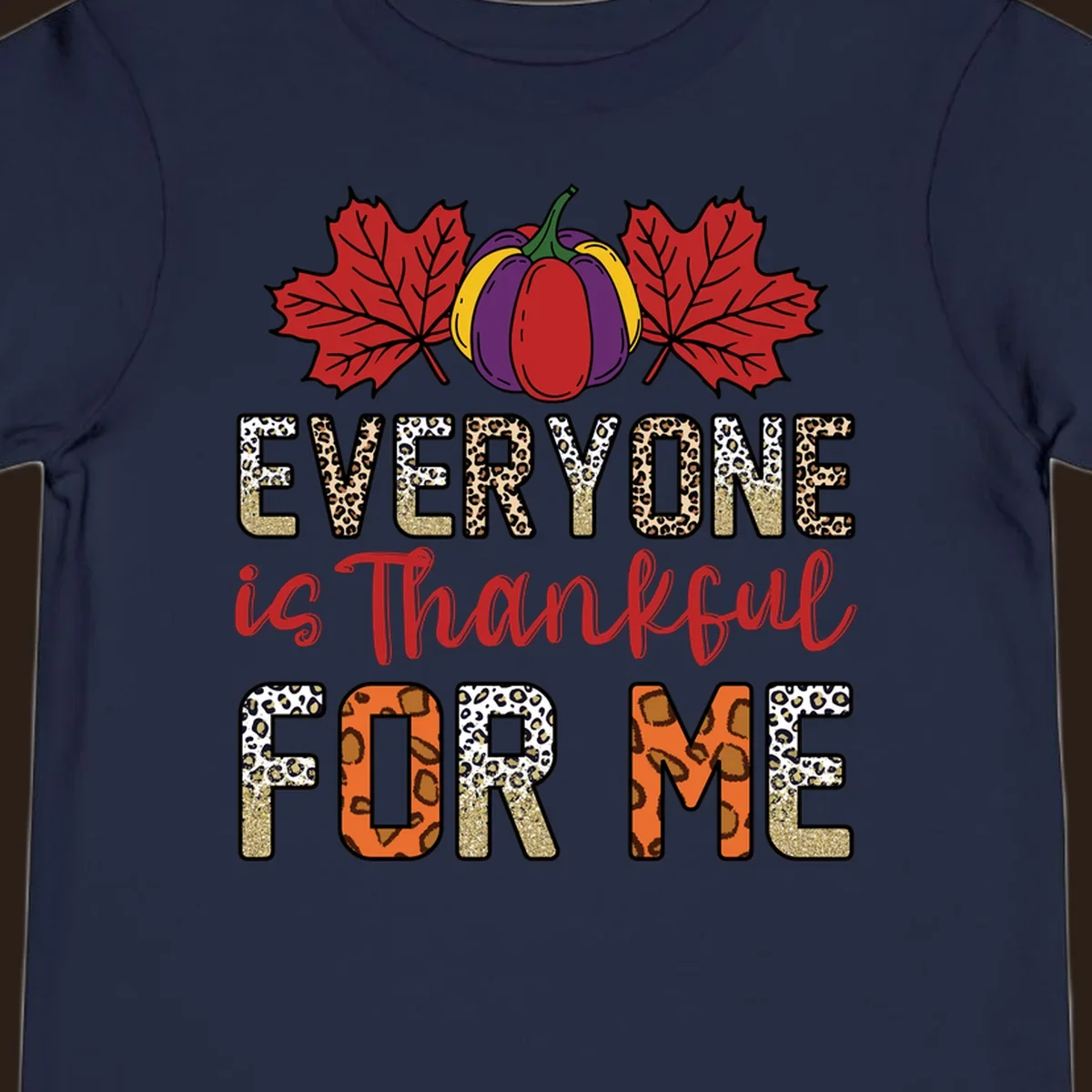Everyone is Thankful For Me text with pumpkin and leaves, leopard print and glitter accents.