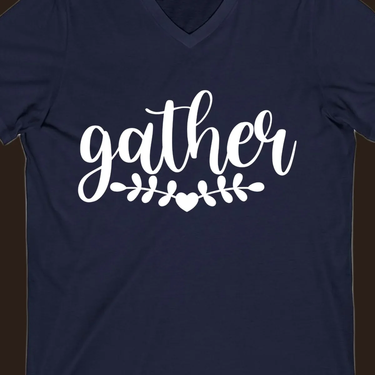 Gather together family script text with heart and leaves illustration.