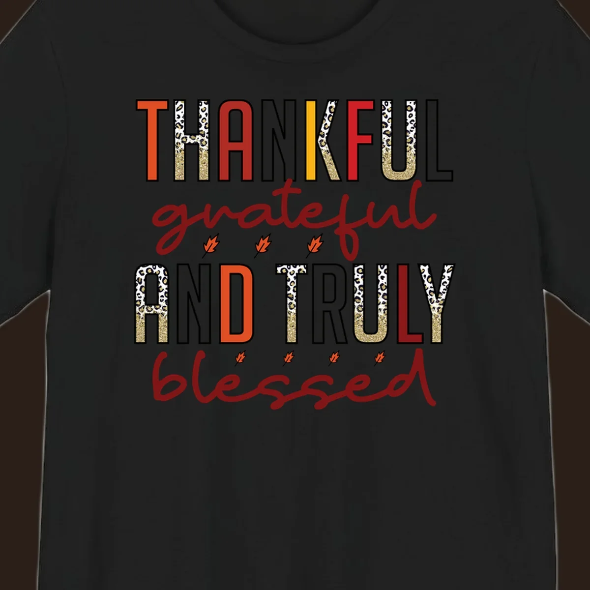 Thankful grateful and truly blessed typography with fall leaf and leopard print accents.