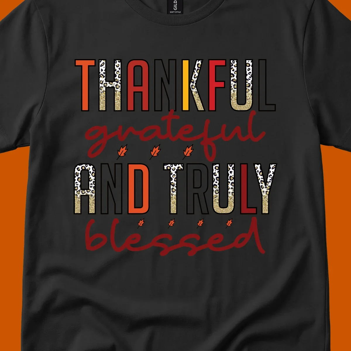 Thankful grateful and truly blessed typography with fall leaf and leopard print accents.