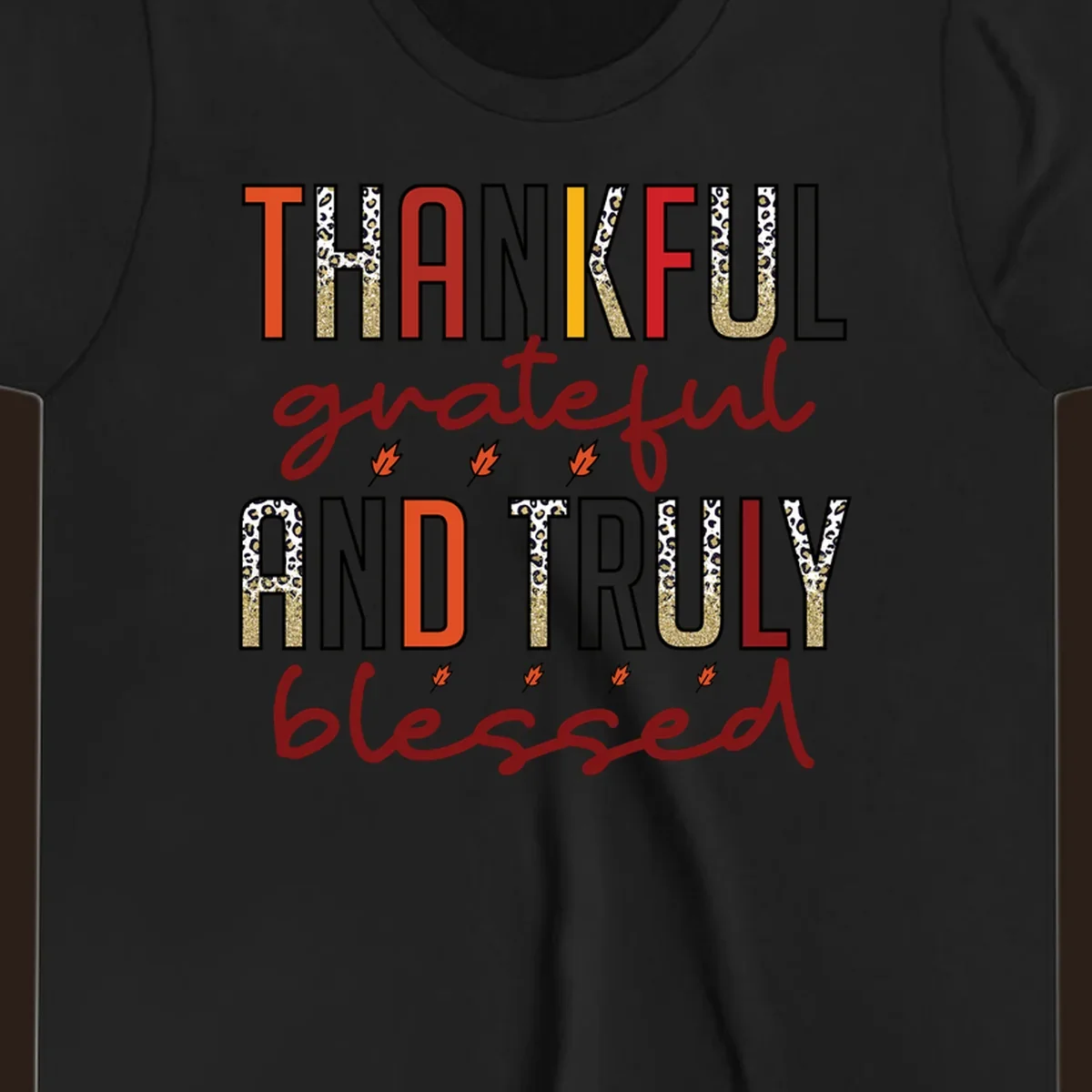 Thankful grateful and truly blessed typography with fall leaf and leopard print accents.