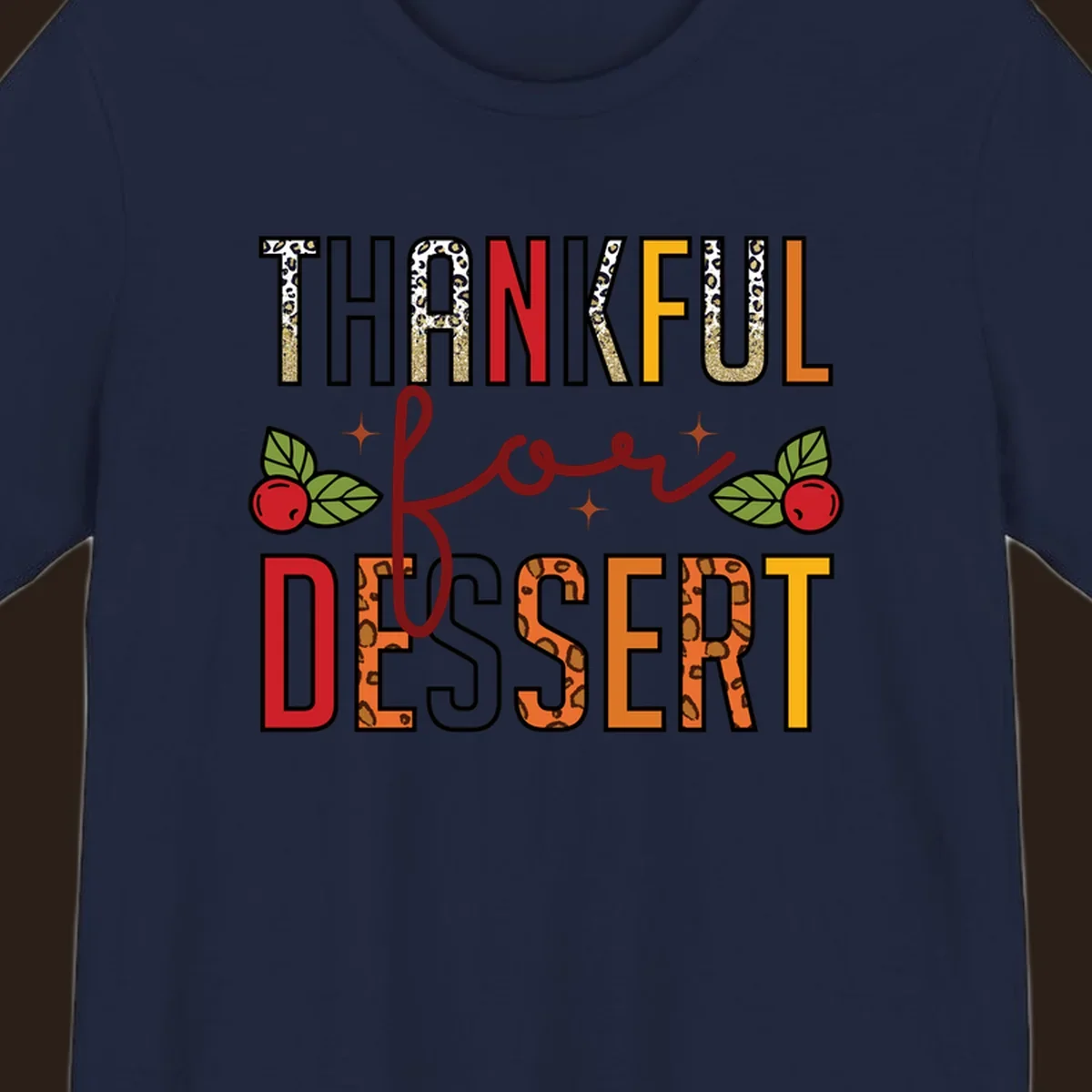 Thankful for Dessert typography with leopard print and cranberries on a dark background.