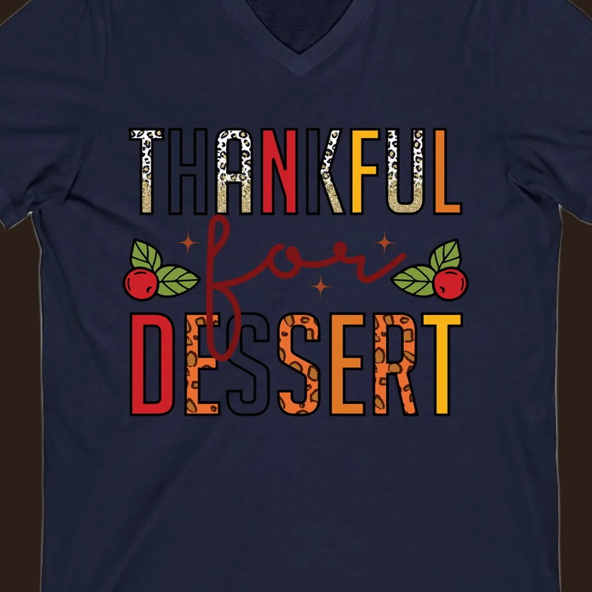 Thankful for Dessert typography with leopard print and cranberries on a dark background.