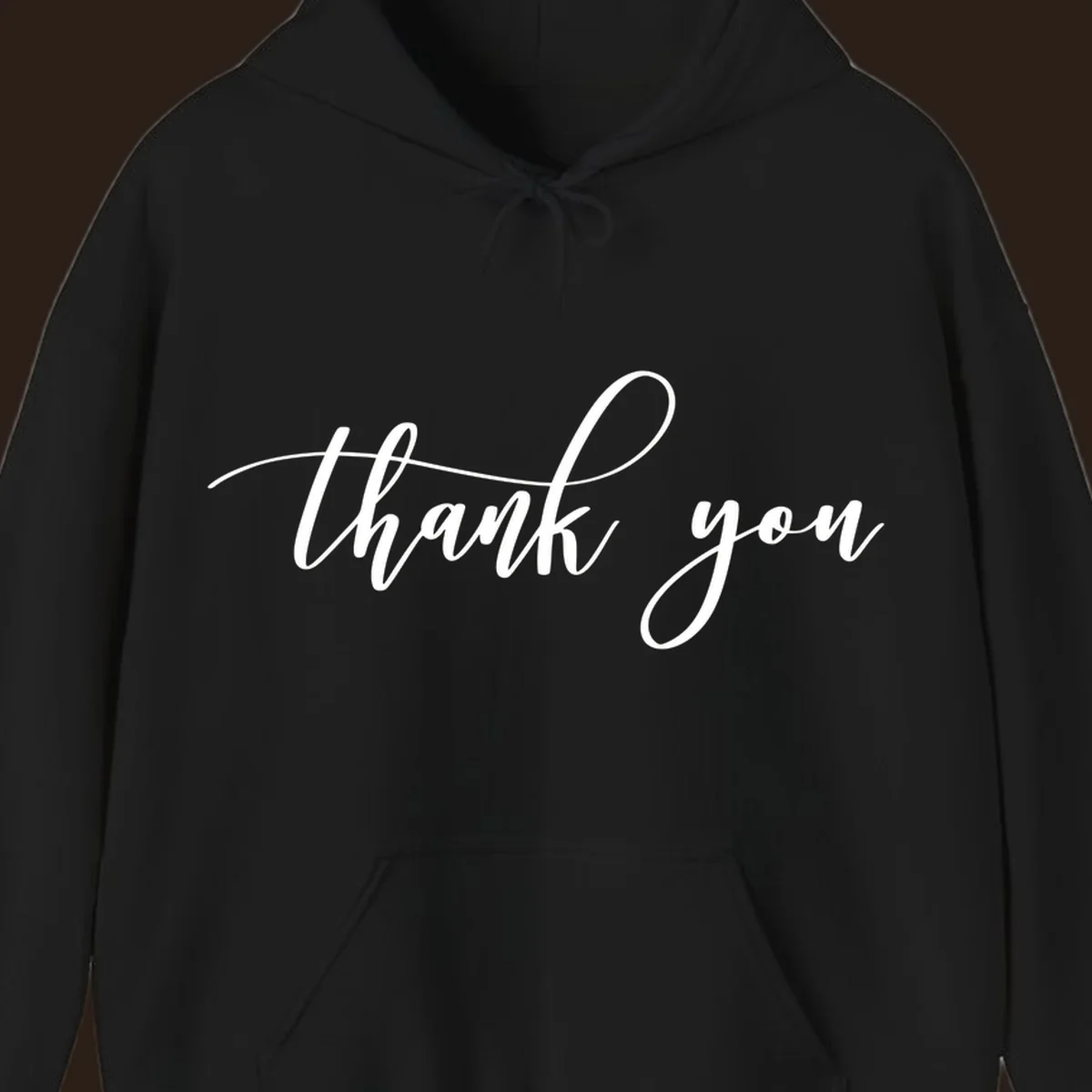 Elegant handwritten thank you script in white on a dark background.