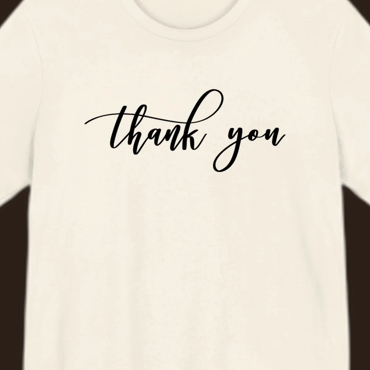 Elegant handwritten thank you script in white on a dark background.