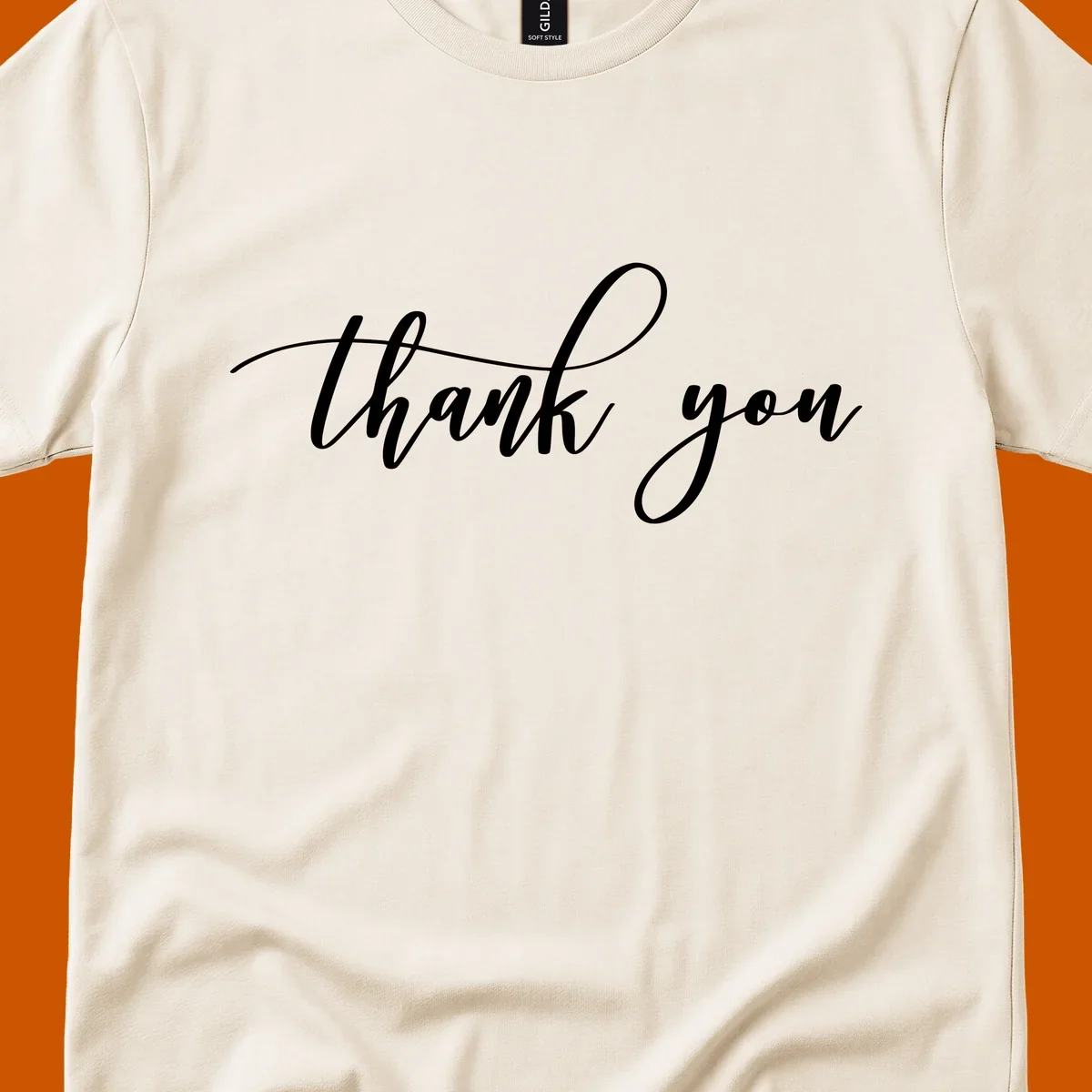 Elegant handwritten thank you script in white on a dark background.