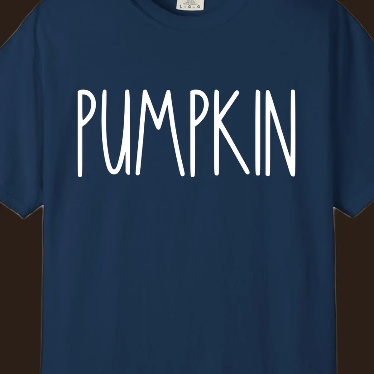 White text design that says PUMPKIN in a bold, hand-drawn font on a black background.