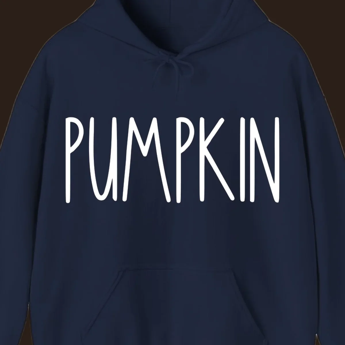 White text design that says PUMPKIN in a bold, hand-drawn font on a black background.