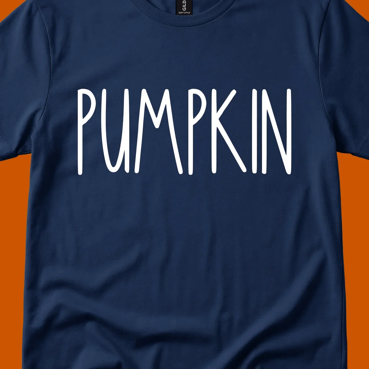 White text design that says PUMPKIN in a bold, hand-drawn font on a black background.