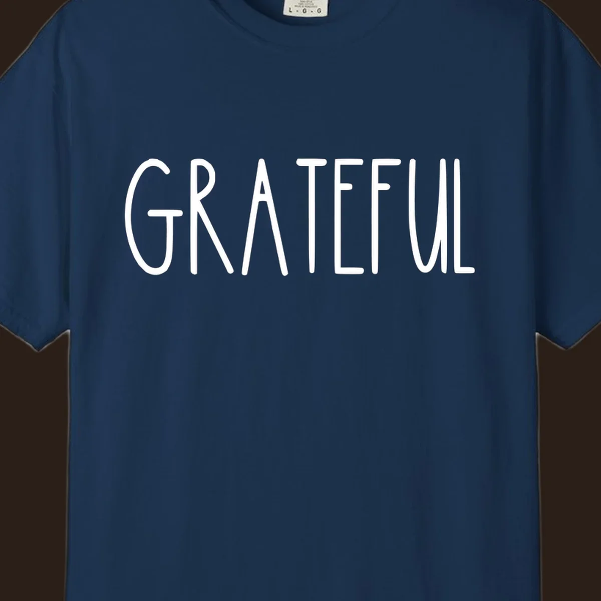 Bold white typography spelling out GRATEFUL, suitable for Thanksgiving.