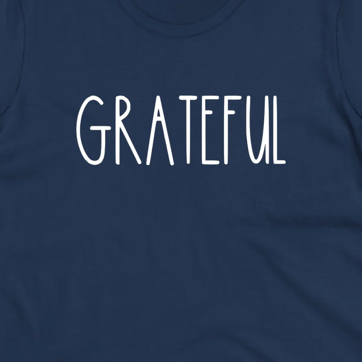 Bold white typography spelling out GRATEFUL, suitable for Thanksgiving.