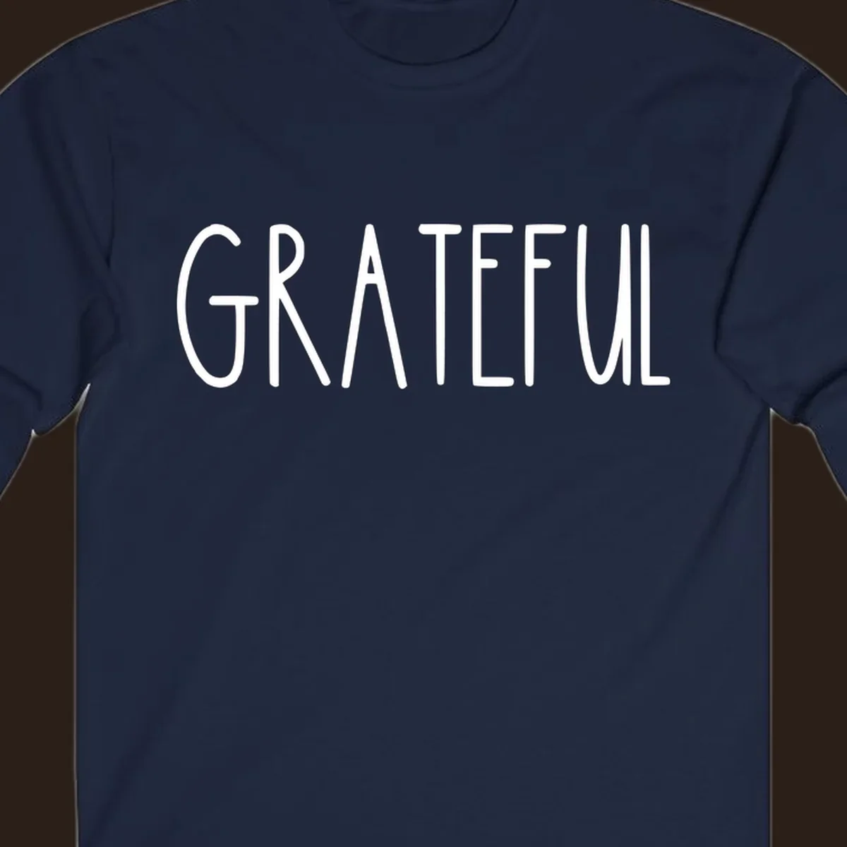 Bold white typography spelling out GRATEFUL, suitable for Thanksgiving.