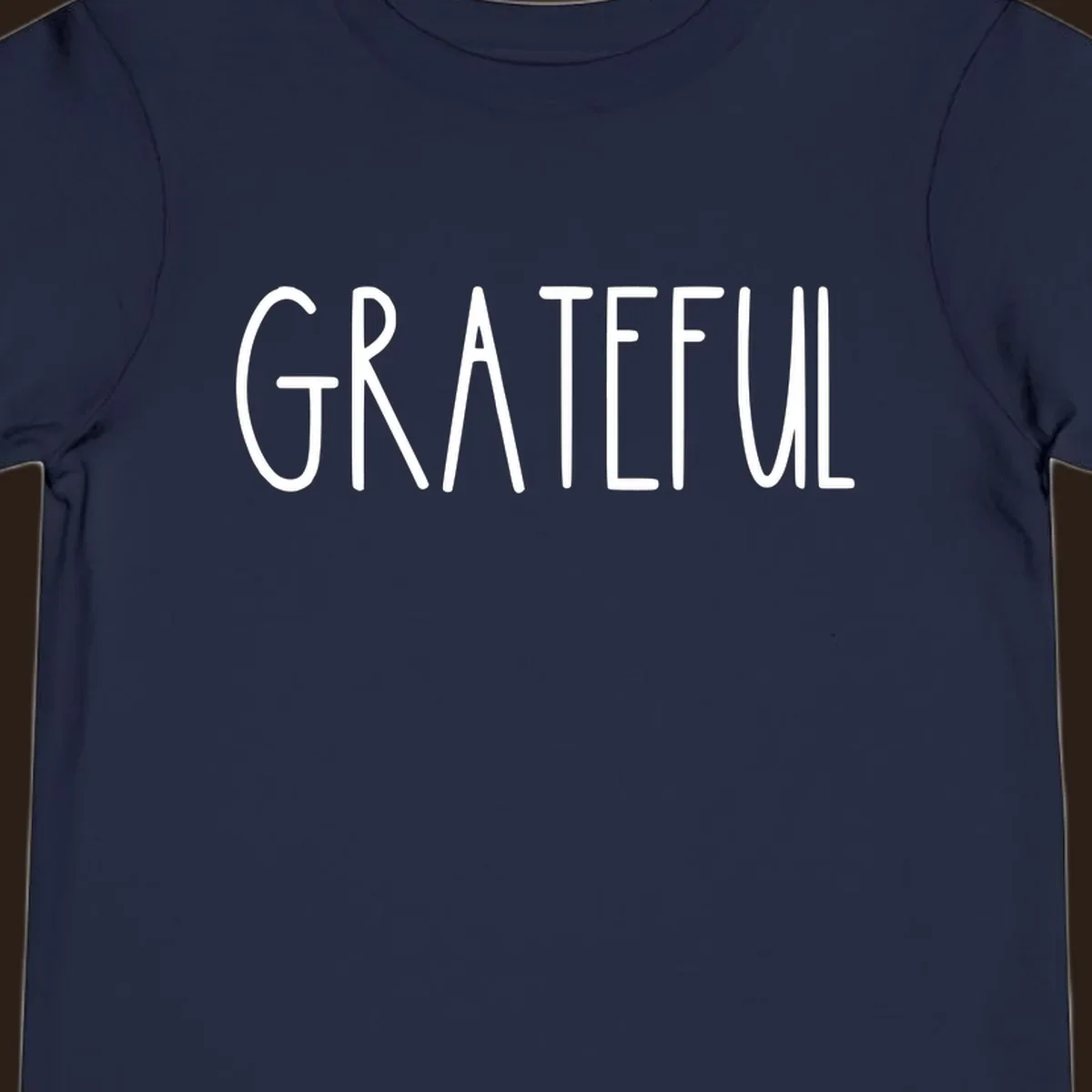 Bold white typography spelling out GRATEFUL, suitable for Thanksgiving.