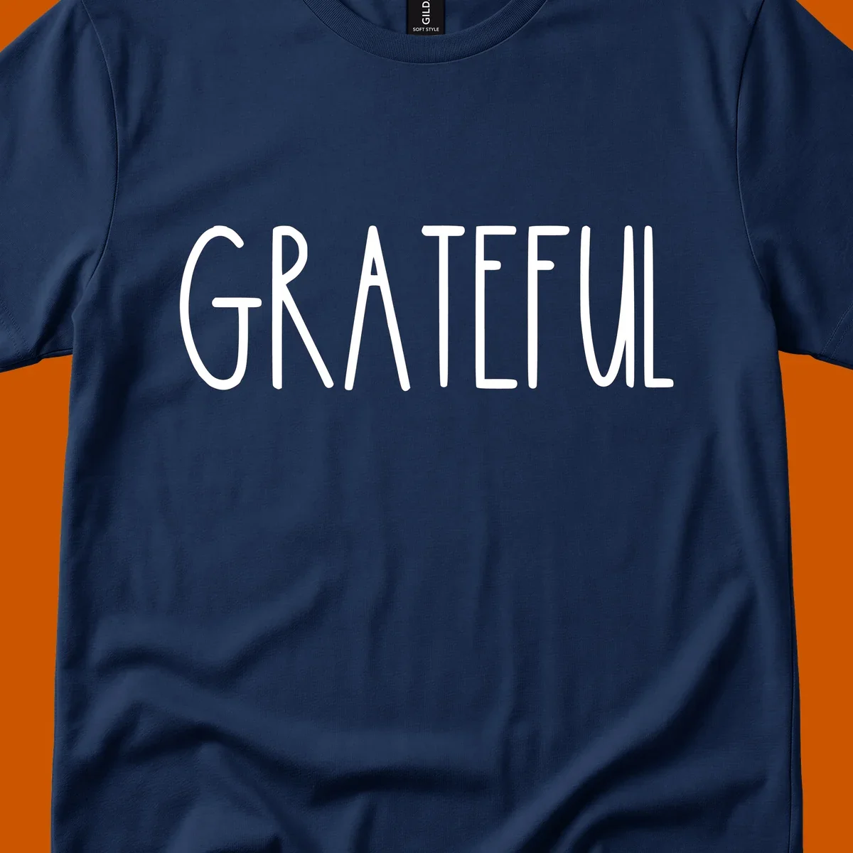 Bold white typography spelling out GRATEFUL, suitable for Thanksgiving.