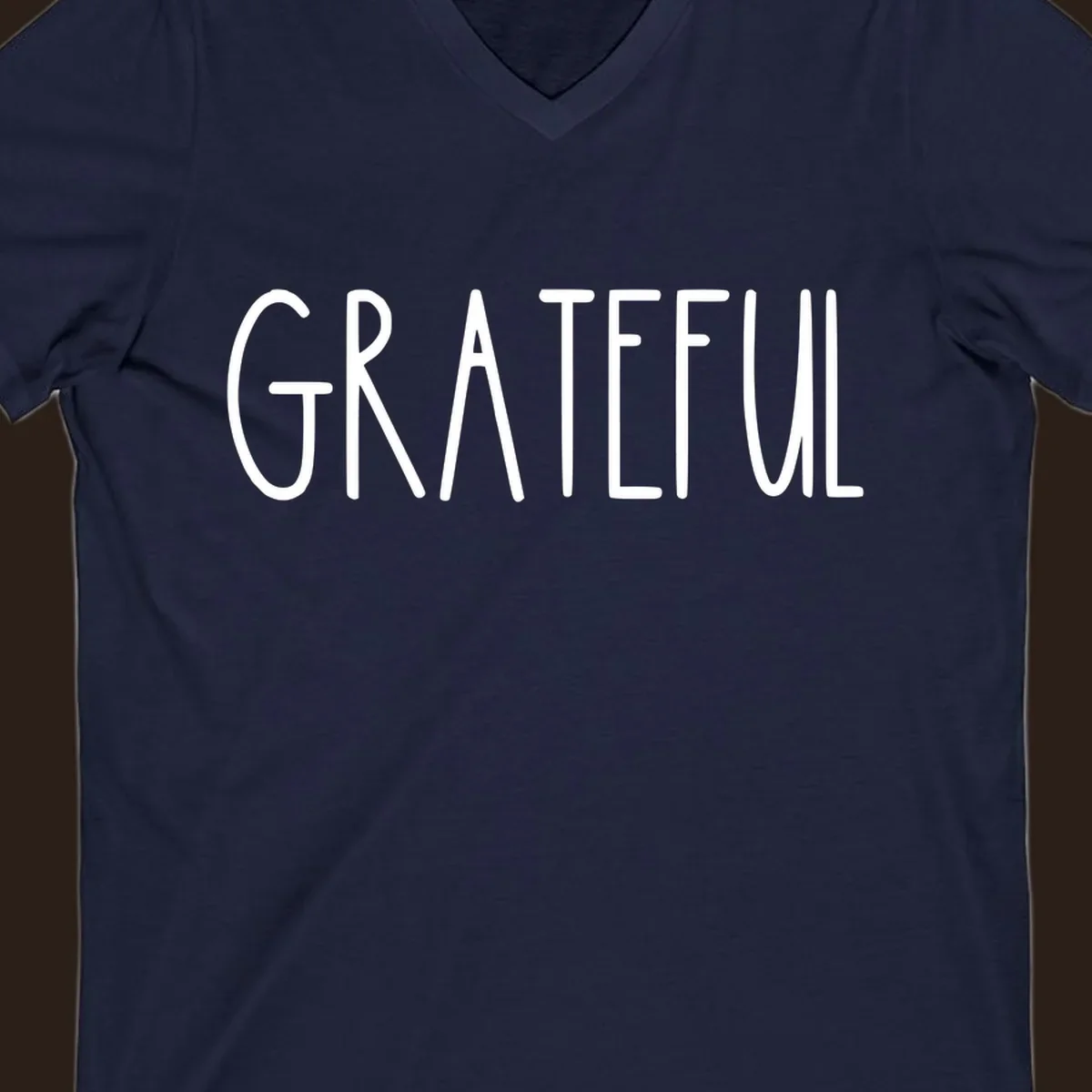 Bold white typography spelling out GRATEFUL, suitable for Thanksgiving.