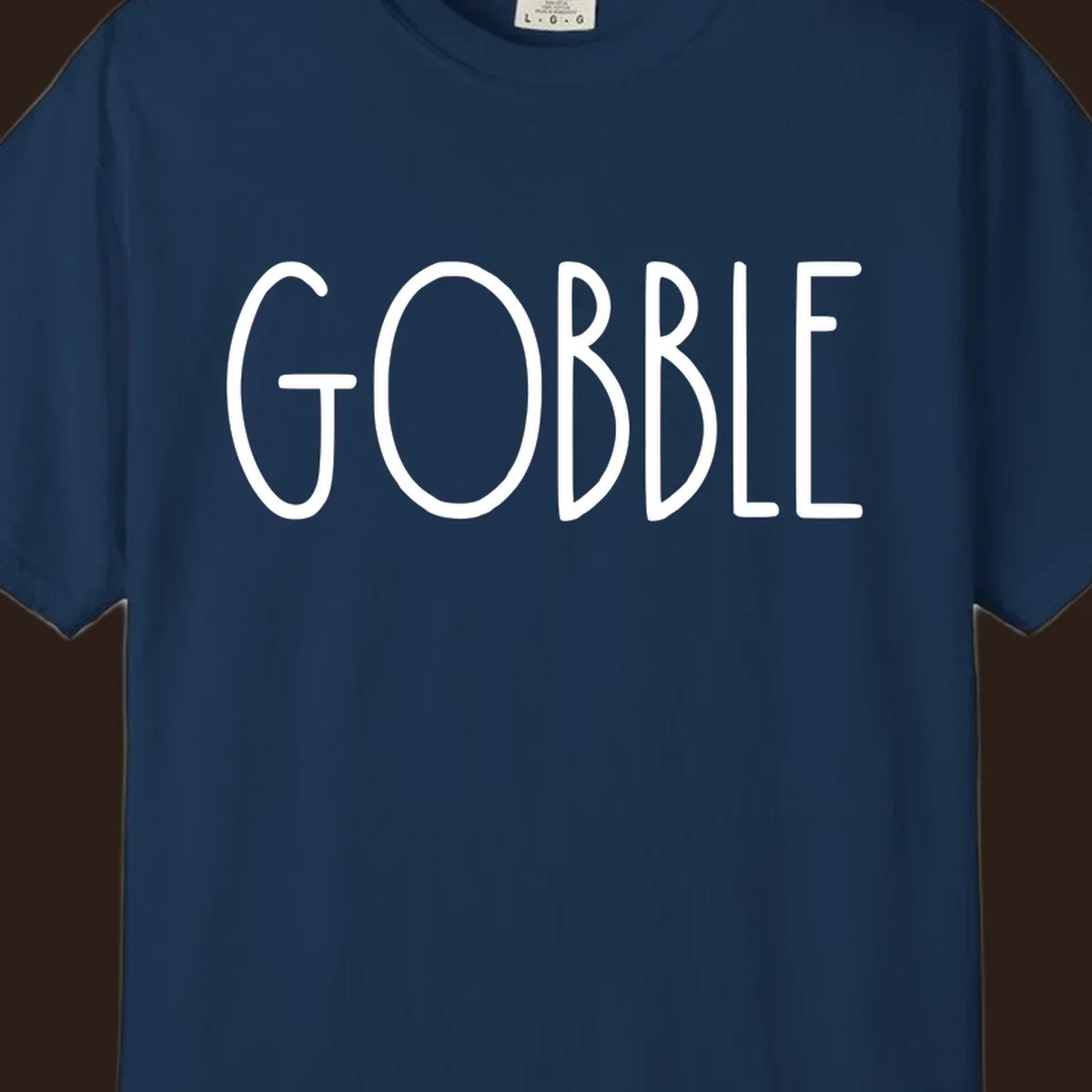 Gobble Thanksgiving text design in white on a dark background.