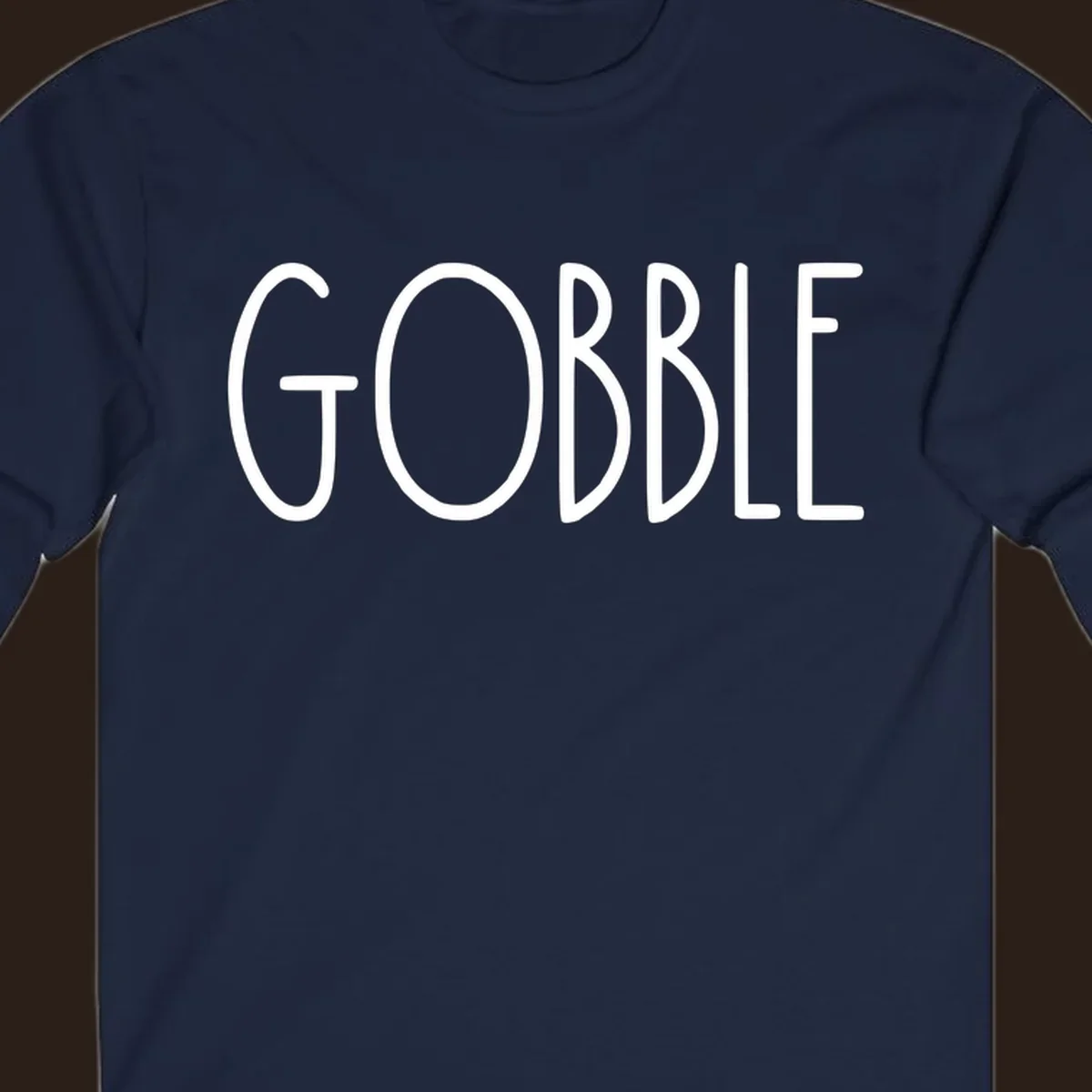 Gobble Thanksgiving text design in white on a dark background.