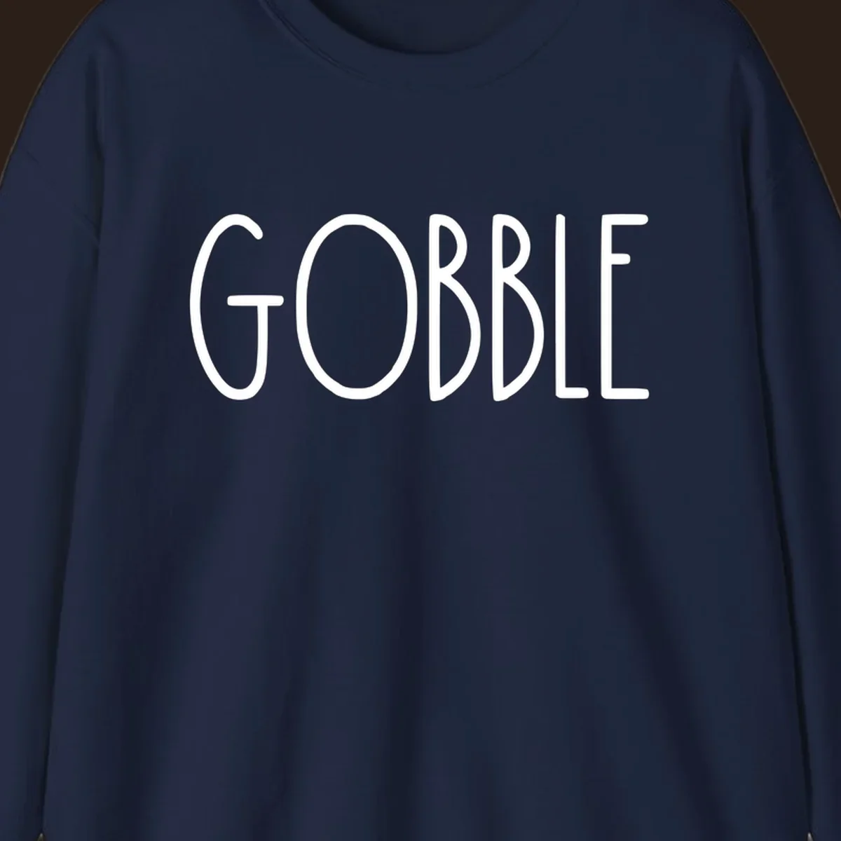 Gobble Thanksgiving text design in white on a dark background.