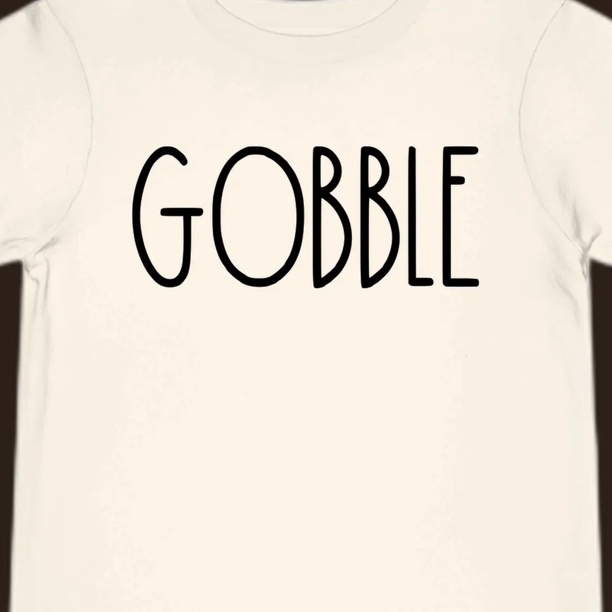 Gobble Thanksgiving text design in white on a dark background.