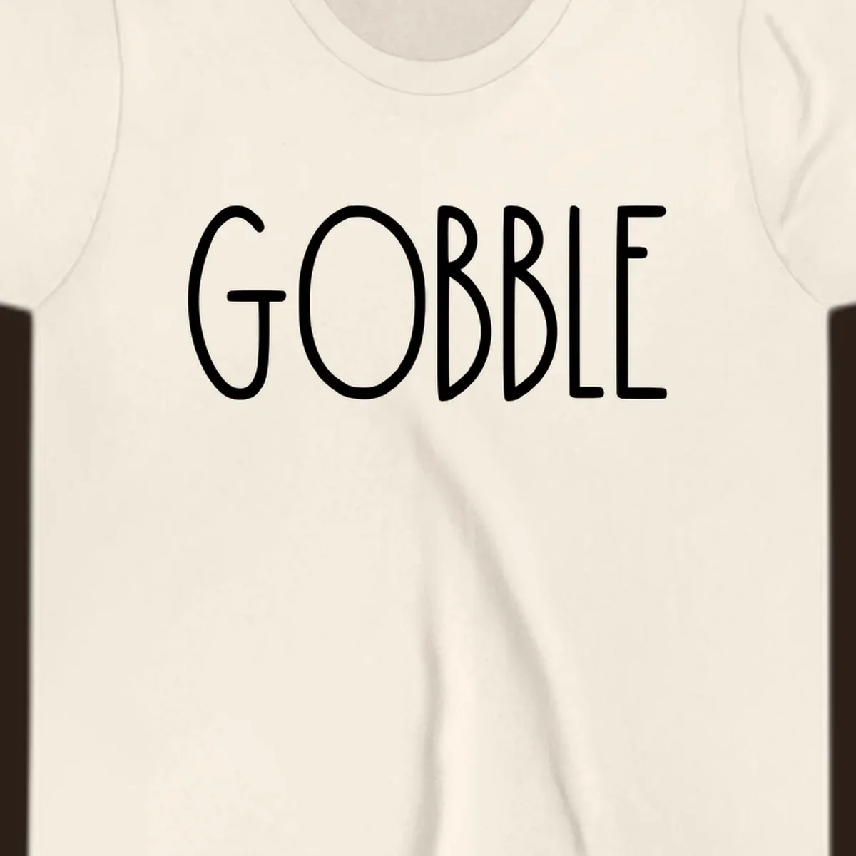 Gobble Thanksgiving text design in white on a dark background.