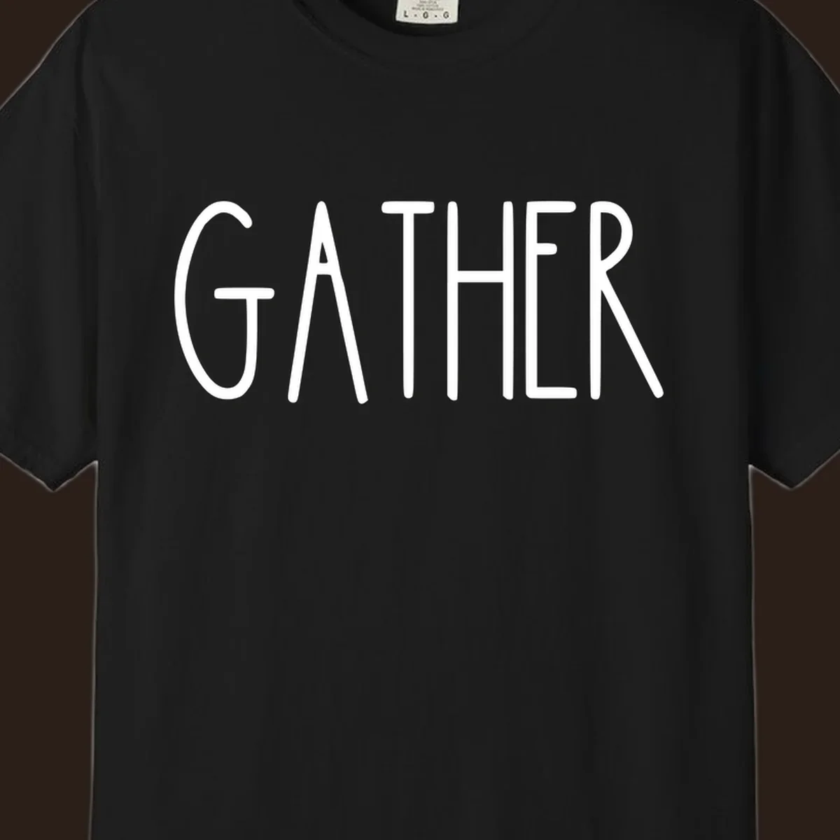White typography design with the word GATHER, for family dinner gatherings.