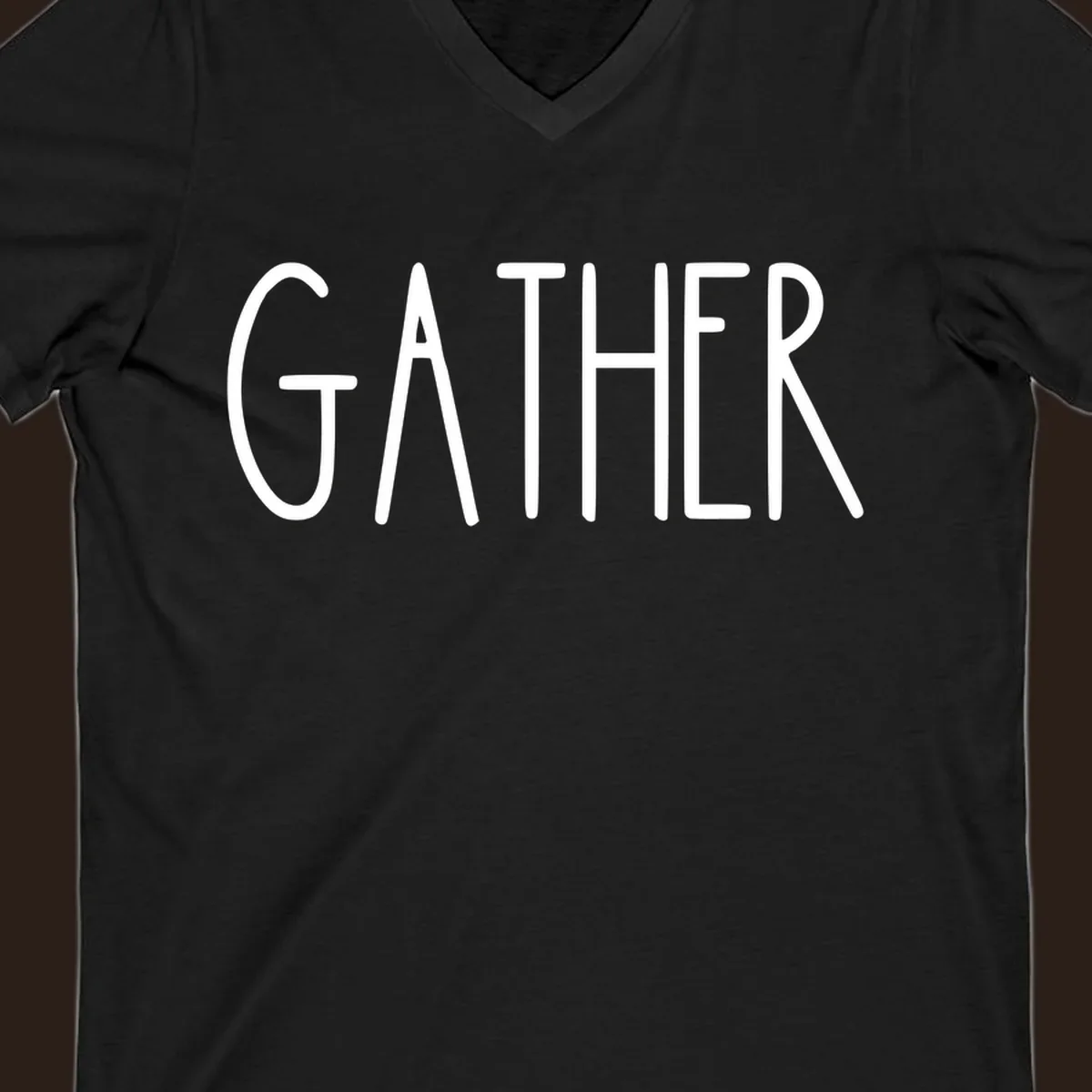 White typography design with the word GATHER, for family dinner gatherings.
