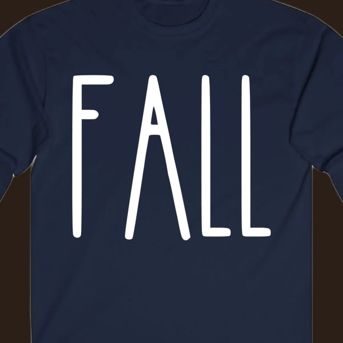 Fall season text design with white lettering on a dark background.