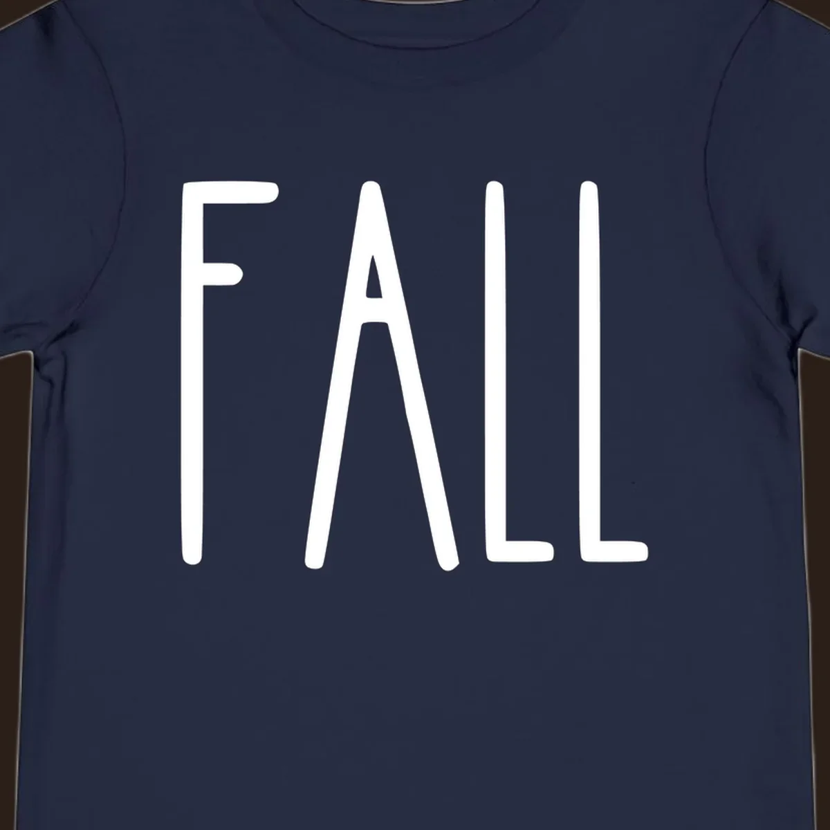Fall season text design with white lettering on a dark background.