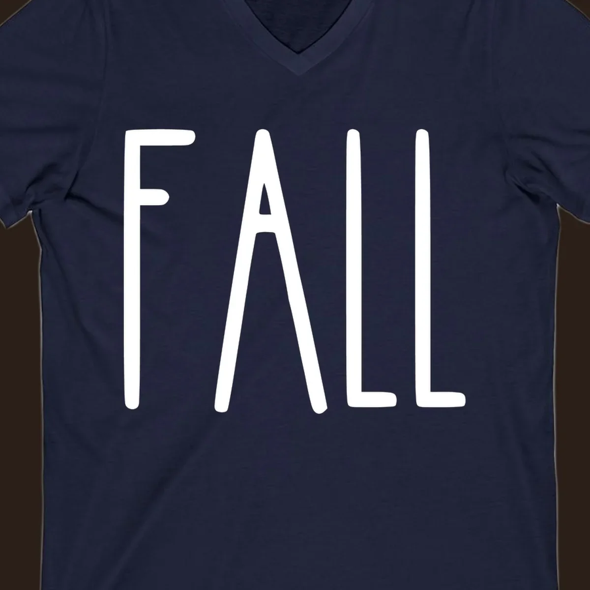 Fall season text design with white lettering on a dark background.