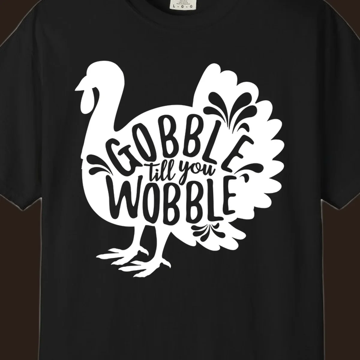 Gobble wobble turkey design with text for Thanksgiving.