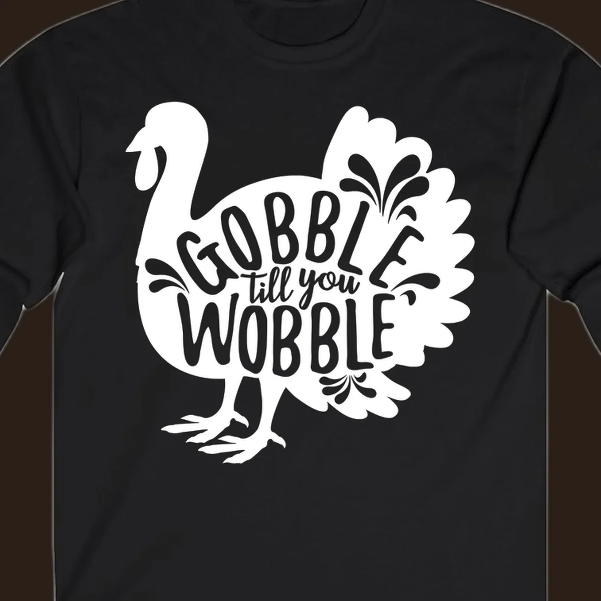 Gobble wobble turkey design with text for Thanksgiving.