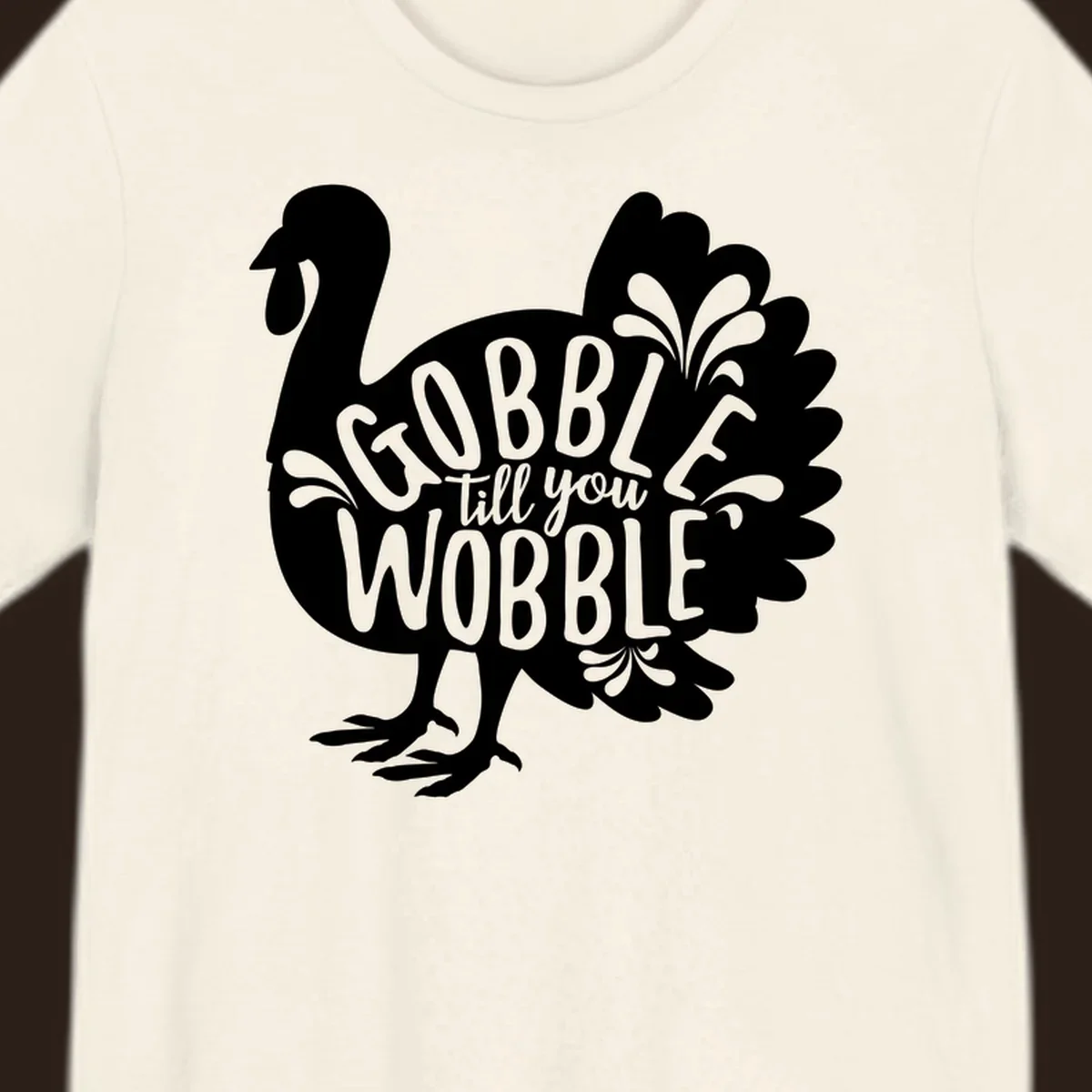 Gobble wobble turkey design with text for Thanksgiving.