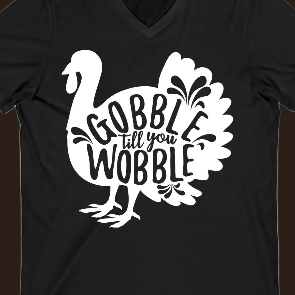 Gobble wobble turkey design with text for Thanksgiving.